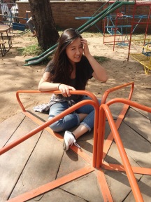 Josephine gets dizzy on the merry-go-round