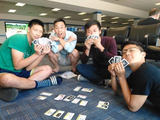 The Star Fluxx crew shows off its cards.
